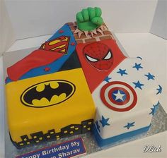 a birthday cake made to look like superheros