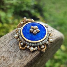 A stunning vintage 1950s 60s  signed brooch/pendant  by Florenza in a Renaissance, Victorian style with cobalt blue enamel centre and ornate trim with  faux pearl detail. (some pearls a little worn) It fastens with a roll over safety clasp and measures  5.2 cm x  4 cm.   Note: Being a vintage piece, any notable damage, missing parts or wear will be described as accurately as possible. However, minor imperfections & signs of wear should be expected. Please consider pictures provided as part of th Pearl Brooch, Victorian Style, Victorian Fashion, Vintage 1950s, Cobalt Blue, Faux Pearl, Florence, Favorite Jewelry, Brooch Pin