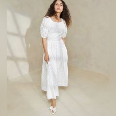 Lantern Puff Sleeve Dress In White Cotton With Lattice Embroidery. Berthe Flares Out From The Hips And Features A Zipper Closure On The Back As Well As Full Lining. Puff Sleeve Broderie Anglaise Dress For Daywear, Elegant Puff Sleeve Dress With Broderie Anglaise, White Dress With Puff Sleeves And Voluminous Skirt, Puff Sleeve Dress Casual, White Puff Sleeve Dress, Billowy Sleeves, Casual Luxe, Dresses Royal, Puff Sleeve Dress