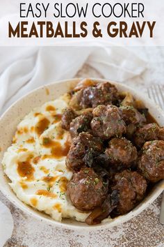 meatballs and gravy in a white bowl on top of mashed potatoes