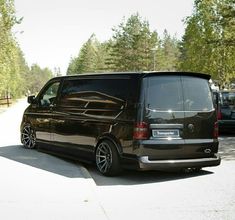 a black van parked on the side of a road