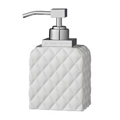 a white soap dispenser on a white background