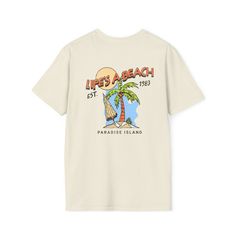 Unleash the carefree spirit of summer with our vibrant 'Life's a Beach' t-shirt.  Crafted from lightweight and breathable fabric, it ensures maximum comfort on sunny days. The playful design captures the essence of beach vibes, adding a splash of fun to any outfit. Whether strolling along sandy shores or enjoying a refreshing ice cream, this t-shirt is a reminder to savor life's simple pleasures. Embrace the sun, sand, and smiles this season, and let 'Life's a Beach' be your mantra for unforgett Sunny Holiday, Beach T Shirt, Sandy Shores, Vacation Vibes, Unisex Gift, Beach T Shirts, Summer Tee, Beach Vibes, Simple Pleasures