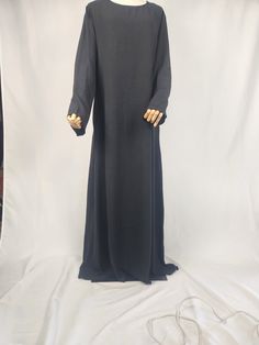 Perfect Inner dress for any of your open Abayas. Pair it with any of our open Abayas in store or you can wear it under any of your existing abaya for extra protection or by it Self.Super comfortable and stretchy material with added pockets.  It come in 2 colors Black and White Modest Fitted Black Abaya, Long Niqab For Eid, Solid Long Thobe For Eid, Long Thobe For Eid, Long Solid Niqab For Eid, Solid Long Niqab For Eid, Solid Long Sleeve Dresses For Eid, Solid Color Long Maxi Dress For Eid, Black Long Sleeve Maxi Dress For Eid