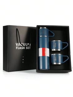 two blue cups in a black box with the words vacuum flask set