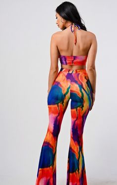 Wide leg pants with matching bikini top, with vibrant swirl detail True to size with stretch Fitted Multicolor Beach Pants, Fitted Multicolor Pants For Beach, Fitted Multicolor Pants For The Beach, Bold Fitted Summer Pants, Fitted Multicolor Bottoms For Beach Season, Fitted Multicolor Bottoms With Vibrant Print, Painting Set, Leg Pants, Wide Leg Pants