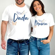 a man and woman standing next to each other wearing matching tshirts that read dada mama