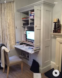 a white desk with a computer on top of it