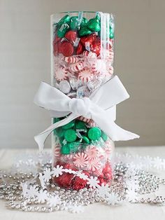 a glass jar filled with candy and candies