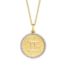 a gold necklace with the letter i on it's front and side, set in 18k yellow gold