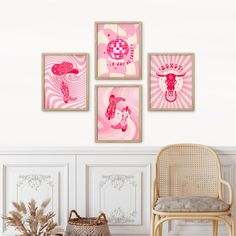 three pink paintings hang on the wall next to a wicker chair and potted plant