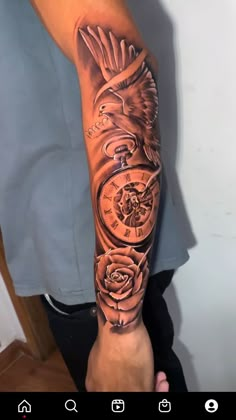 an arm with a clock and roses on it