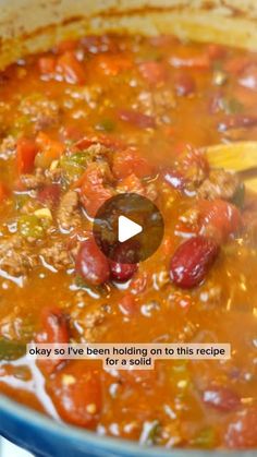 a pot filled with meat and vegetables on top of a stove