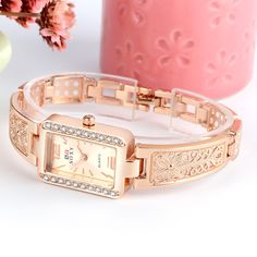 Luxury Bracelet Ladies Stylish WatchA watch is always an appreciated gift, making the Luxury Bracelet Ladies Stylish Watch a perfect choice for any special occasion. We believe this luxury timepiece conveys appreciation and regard, making the recipient feel special.An Ideal Gift for Her For the special day that&apos;s just around the corner, consider gifting her the Luxury Bracelet Ladies Stylish Watch. Not only does it make a thoughtful present, but it also stands out with its distinct design and luxury elements. A Unique, Feminine Design Ordinary watches can be plain, while the Luxury Bracelet Ladies Stylish Watch stands out with its intricate beauty. This timepiece expertly combines the function of a watch with the aesthetics of a bracelet, resulting in a product that is as practical as Watches Rose Gold, Ladies Bracelet Watch, Rose Gold Watches Women, Rhinestone Watches, Swiss Army Watches, Ladies Bracelet, Bracelet Watches Women, Luxury Bracelet, Watch Women