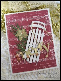 a close up of a greeting card with music notes on it and a christmas ornament