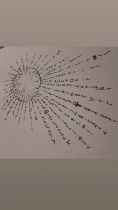 an image of writing on paper with many letters in the shape of a sunburst