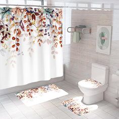 a bathroom with a shower curtain and two rugs on the floor in front of it