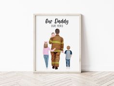 a fireman and two children are standing in front of a white wall with the words our daddy, our hero