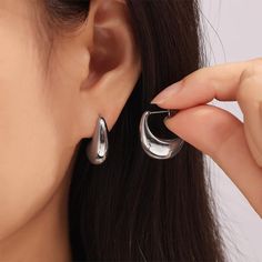 CRESCENT HOLLOW EARRINGS – MANDUORAN Minimalist Alloy Drop Earrings, Trendy Hoop Earrings Made Of Alloy, Alloy Drop Hoop Earrings, Trendy Silver Alloy Earrings, Nickel-free Trendy Alloy Hoop Earrings, Trendy Pierced Alloy Hoop Earrings, Trendy Pierced Hoop Earrings, Silver Tarnish Resistant Plug Earrings, Silver Chic Plug Earrings