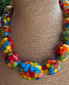 Make a statement with this lovely colourful necklace featuring Blue, Green, Yellow & Red Resin Beads. Screw fastening integrated inside bead so no metal touches the skin. HANDMADE & FAIRTRADE Links for other styles:  https://thepeepaltree.etsy.com/uk/listing/1808683063/colourful-statement-necklace-costume https://thepeepaltree.etsy.com/uk/listing/1807320603/colourful-bead-necklace-costume Items posted to addresses within the UK will be sent Royal Mail 1st Class UK Standard. International post wi Colorful Statement Necklace, Colourful Necklace, Resin Beads, Favorite Jewelry, Halloween Shopping, Statement Necklace, Beaded Jewelry, Beaded Necklace, Jewelry Necklaces