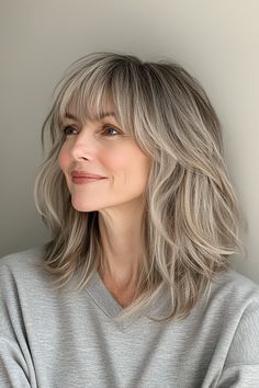 25+ Youthful Hairstyles with Bangs for Older Women You Must See in 202 – CreativeBooster Shag With Wispy Bangs, Bangs For Older Women, Layered Shag, Youthful Hairstyles, Shag Cut, Older Women's Hairstyles, Blonde Layers