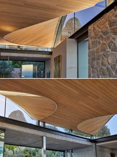 A modern home interior with clerestory windows and an undulating wood-lined ceiling. Living And Dining Room, Free Standing Bath Tub