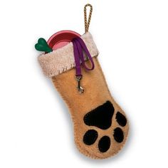 a dog paw stocking hanging on a white wall