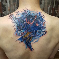 a person with a tattoo on their back