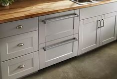 the kitchen counter is clean and ready to be used as a dishwasher or sink