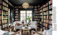 a living room filled with lots of books