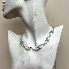 Embrace the effortless style of the Y2K era with this relaxed wavy chain choker. Featuring a minimalist design that’s perfect for layering or wearing solo, this choker adds a sleek, modern twist to your fashion look. Ideal for Y2K lovers, alternative style fans, or anyone looking to complete their chic, on-trend outfit.

Hashtags: #Y2KJewelry #ChainChoker #MinimalistNecklace #Y2KStyle #AlternativeFashion #TrendyNecklace #FashionAccessories #EdgyChoker #StatementNecklace #ModernJewelry Hip Hop Accessories, Trend Outfit, Collar Chain, Y2k Era, Alternative Style, Unisex Jewelry, New Trend