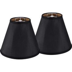 two black lampshades sitting next to each other