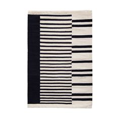 a black and white rug with stripes on it