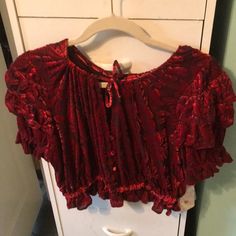 Nwot Free People Red Velvet Blouse With Tie At Neck And Buttons Down The Front, Waist Is Cinched And Fitted Shirt Has Some Stretch, Sleeves Are Capped. A Really Pretty Elegant Blouse. Shirt Has Never Been Worn And Comes From A Smoke Free Home, Shirt Is In Flawless Condition Red Whimsigoth Outfit, Red Velvet Blouse, Raspberry Ripple, Goth Shirt, Velvet Blouse, Upcycle Shirt, Red One Piece, Brown Blouse, Half Shirts