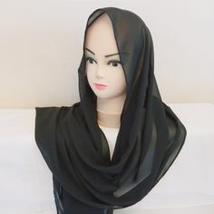 An exquisite scarf made of soft, delicate chiffon that drapes beautifully. A magnificent mantilla in a delicate black color. Beautiful veil mantilla. You can choose a scarf with a hair clip. SIZE: Approximately 79 x 18 inches (200 x 48 cm) The chapel veil can be made in other sizes upon individual order. You will receive a storage bag for the mantilla free of charge. Instructions for use: Wash by hand and dry on a horizontal surface. Iron with a cold iron. Color reproduction may vary depending on monitor settings. Due to the delicate nature of the product, the scarf is final and cannot be returned, but if you have any questions, please contact me, I will make sure to resolve the issues. Black Chiffon Dupatta For Wedding, Wedding Black Chiffon Dupatta, Black Wedding Shawl Scarf, Veil Mantilla, Latin Mass, Beautiful Veil, Chapel Veil, Black Chiffon, Chiffon Scarf