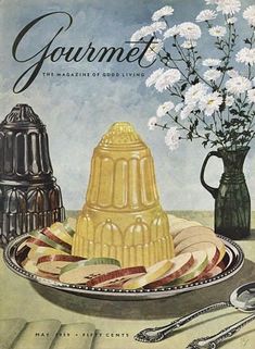 an advertisement for gourmet magazine with flowers in the vase and plates on the table