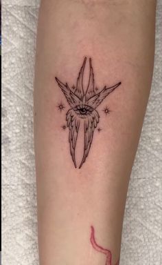 a small tattoo on the leg of a woman