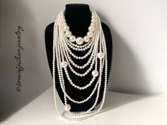 "Big bold white multi strand long layered pearl necklace. Stunning Unique 10 layers of different size acrylic pearls make this necklace truly showstoppers. There's nothing like pearls to feel your most classic and feminine,  Approximate length: 17.5\" + 3.5\" L (45cm+9cm) Comes with earrings If you have any question please contact me Similar style: https://www.etsy.com/listing/1646429968/extra-long-chunky-big-layered-necklace I am inviting you to explore and enjoy my jewelry store; perhaps you will discover something unique for yourself or as a gift for someone special in your life. Thank you! https://www.etsy.com/shop/BravaFashionJewelry Hi and welcome to BravaFashionJewelry It is very important that you are completely satisfied with your purchase. Please contact me if you have any proble White Multi-strand Layered Pearl Necklace, White Multi-strand Layered Necklace With Pearl Chain, White Elegant Multi-strand Layered Necklace, Elegant White Multi-strand Layered Necklace, Multi-strand White Pearl Necklace For Parties, White Multi-strand Pearl Necklace For Party, Party Multi-strand White Pearl Necklace, White Pearl Layered Necklace For Parties, Pearl Bib Necklace