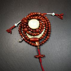 ❤This bodhi beads mala is made by Tibetan craftsmen and come from Hepo Town, Baiyu County, the birthplace of the famous Tibetan handicrafts,about 30 years old, hold and blessed by a lama in Baiyu Monastery.It is composed of 108 bodhi seed beads, and is equipped with 3 agate beads, silver bead counters are installed on both sides, 1 mani jewel bead clip,and finally consists a bone guru bead and vajra on the end, very elegant.❤Details1. Handmade 108 bodhi beads approximately 8mm,mala's perimeter i Traditional Handmade Beaded Bracelets For Meditation, Bohemian 108 Beads Mala For Blessing, Bohemian Mala With 108 Beads For Blessing, Spiritual Wooden Beads Jewelry For Blessing, Spiritual Jewelry With Wooden Beads For Blessing, Bohemian Mala With 8mm Beads For Blessing, Handmade Spiritual Mala For Rituals, Spiritual Mala With 108 Beads For Blessing, Traditional Handmade Mala For Meditation