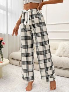 Elevate your relaxation game with our Plaid Printed Tie Front Sleep Pants. Embrace casual comfort in style with the charming bow front and knot details. Designed for ultimate relaxation, the loose fit and soft 100% Polyester composition ensure a cozy night's sleep. Long length, non-stretch fabric, and easy care instructions make lounging a breeze. Experience the perfect blend of fashion and comfort today! Features: Style: Casual Pattern Type: Plaid Details: Bow Front, Knot, Tie Front Type: Pajam Casual Fall Sleep Bottoms, Casual Sleep Bottoms For Fall, Cotton Pants With Tie Waist For Loungewear, Cotton Loungewear Pants With Tie Waist, Cotton Lounge Pants With Tie Waist, Loungewear Pants With Tie Waist, Tie Waist Loungewear Pants, Loungewear Tie Waist Long Pants, Casual Loungewear Pants With Tie Waist