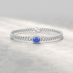 Unveil your style with our 10K Solid Gold Cuban Chain Link Bracelet, adorned with captivating Natural Blue Sapphires and meticulously crafted Lab Grown Diamonds. Personalize this bracelet with your choice of design, making it a one-of-a-kind treasure. 𝐅𝐞𝐚𝐭𝐮𝐫𝐞𝐬:• 𝐌𝐚𝐝𝐞 𝐭𝐨 𝐎𝐫𝐝𝐞𝐫• 𝐌𝐞𝐭𝐚𝐥: 𝟏𝟎𝐊 𝐆𝐨𝐥𝐝 | 𝟏𝟒𝐊 𝐆𝐨𝐥𝐝 | 𝟏𝟖𝐊 𝐆𝐨𝐥𝐝• 𝐁𝐚𝐧𝐝 𝐂𝐨𝐥𝐨𝐫𝐬: Rose Gold, Yellow Gold & White Gold• 𝐁𝐫𝐚𝐜𝐞𝐥𝐞𝐭 𝐖𝐢𝐝𝐭𝐡: 8.60 MM• 𝐁𝐫𝐚𝐜𝐞𝐥𝐞𝐭 𝐓𝐡𝐢𝐜𝐤𝐧𝐞𝐬𝐬: 5.4 Luxury Blue Oval Diamond Bracelet, Fine Jewelry Blue Diamond Cut Bracelets, Blue Diamond Cut Bracelet For Formal Occasions, Fine Jewelry Blue Diamond Cut Bracelet, Blue Fine Jewelry Bracelet Hand Set, Luxury Blue Gemstone Diamond Bracelet, Blue Hand Set Fine Jewelry Bracelet, Fine Blue Diamond Cut Bracelet, Formal Blue Diamond-cut Bracelet