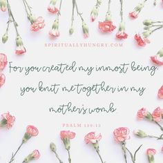 pink flowers with a bible verse written in the middle