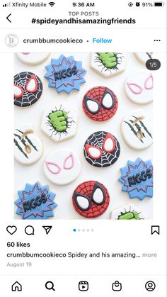 the cookies are decorated with spiderman designs