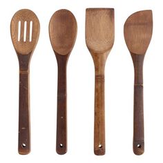 four wooden utensils lined up next to each other