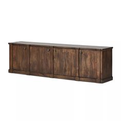 the sideboard is made out of wood and has three doors