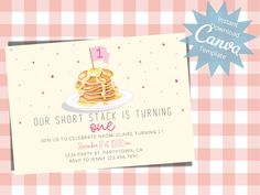 a pink and white checkered table cloth with a card that says, our short stack is turning one