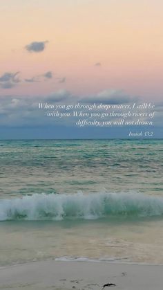 an ocean with waves and a bible verse on the beach at sunset or sunrise time