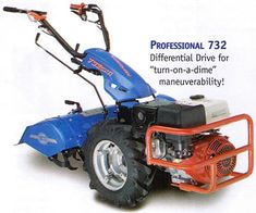 a blue and red lawn mower sitting on top of a white surface