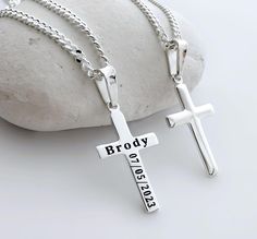 Wear your faith proudly with this modest yet elegant inexpensive Cross in 925 Sterling Silver, it makes Christian gifts to Glorify Jesus Christ.  Use this link below to add on the engraving service: https://etsy.me/30lndjH This listing is for the smaller bevelled edge detail Cross shown in the last picture. Here is the listing for the larger Cross: http://etsy.me/1GJXPtl . Collection Small Crosses this link: http://etsy.me/1D8fIPo Cast using 100% sterling silver, no pewter, nickel or lead was us Silver Classic Jewelry For Baptism, Classic Silver Jewelry For Baptism, Silver Cross Pendant Necklace With Name, Silver Name Necklace With Cross Pendant, Sterling Silver Necklace For First Communion, Silver Cross Jewelry With Name, Silver Cross Necklaces With Name Detail, Silver Name Necklace With Cross Shape, Silver Cross Pendant Jewelry For Baptism