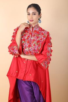 Red asymmetric tunic with floral, tassel embroidery. Paired with a contrast dhoti pant. - Aza Fashions Festive Kurta With Tassels, Festive Kurta With Tassels And Traditional Drape, Designer Salwar Kameez With Tassels For Navratri, Festive Bollywood Kurta With Tassels, Anarkali Kurta With Tassels In Traditional Drape, Tops With Dupatta For Festivals In Traditional Drape, Traditional Drape Tops With Dupatta For Festivals, Bollywood Style Kurta With Tassels And Traditional Drape, Bollywood Style Festive Kurta With Tassels